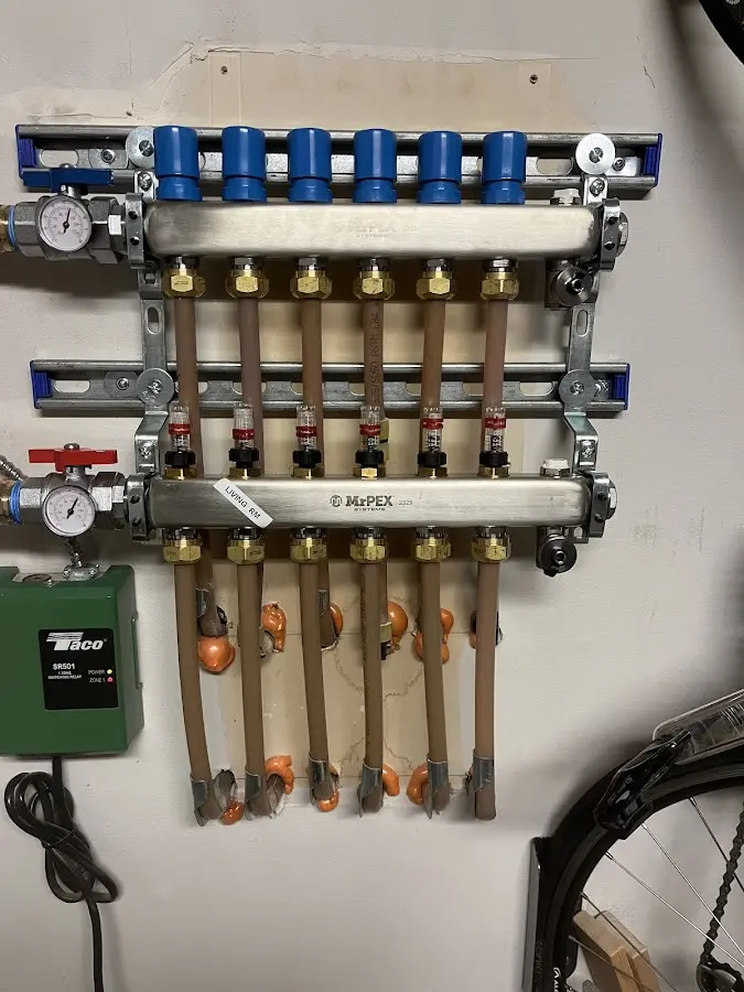 Plumber performing Water Heater Repair at a residential property in Western Springs